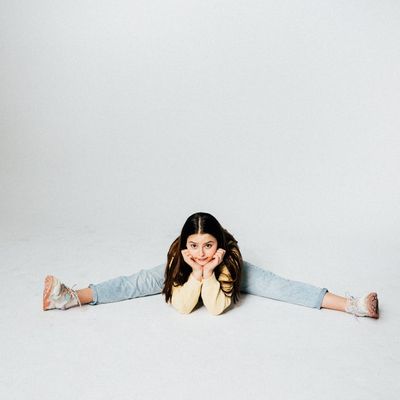 Dynamic photo of a deep stretch, highlighting flexibility.