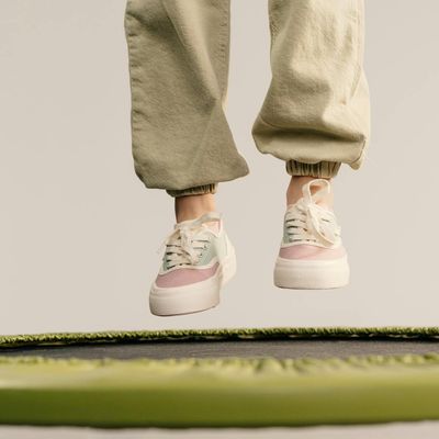 Energetic leap of a person captured mid-air.